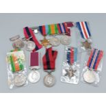 A collection of WWII medals to include Defence Medals, Stars, War Medals and others