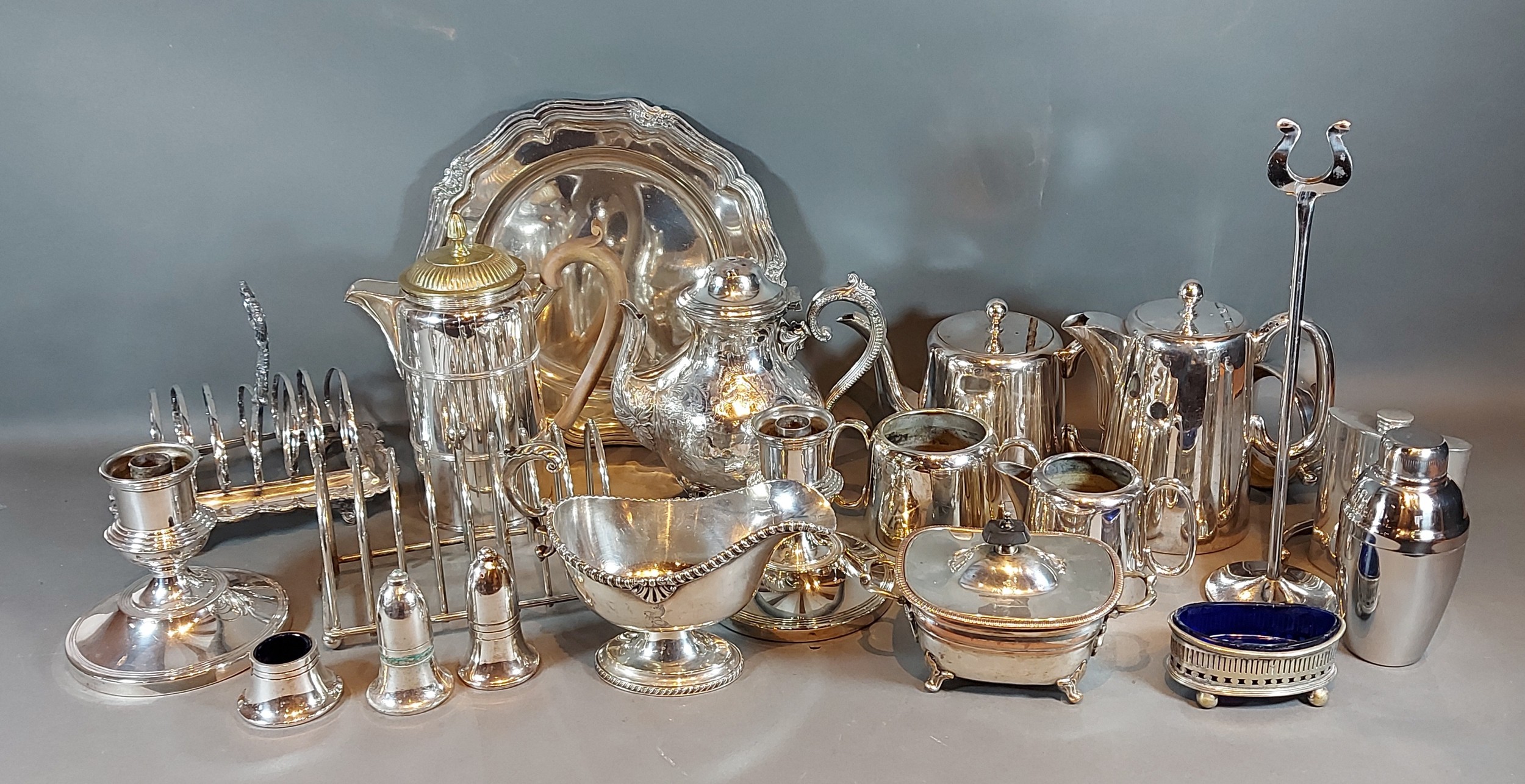 A silver plated four piece tea set, together with a collection of silver plated items