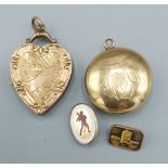 A 9ct gold locket in the form of a heart together with another locket and two small 9ct gold