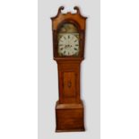 A 19th Century longcase clock, the arched hood with swan neck pdiment above a rectangular door and