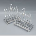 A pair of six division toast racks in the form of golf clubs
