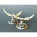 A pair of Chester silver and Mother Of Pearl knife rests