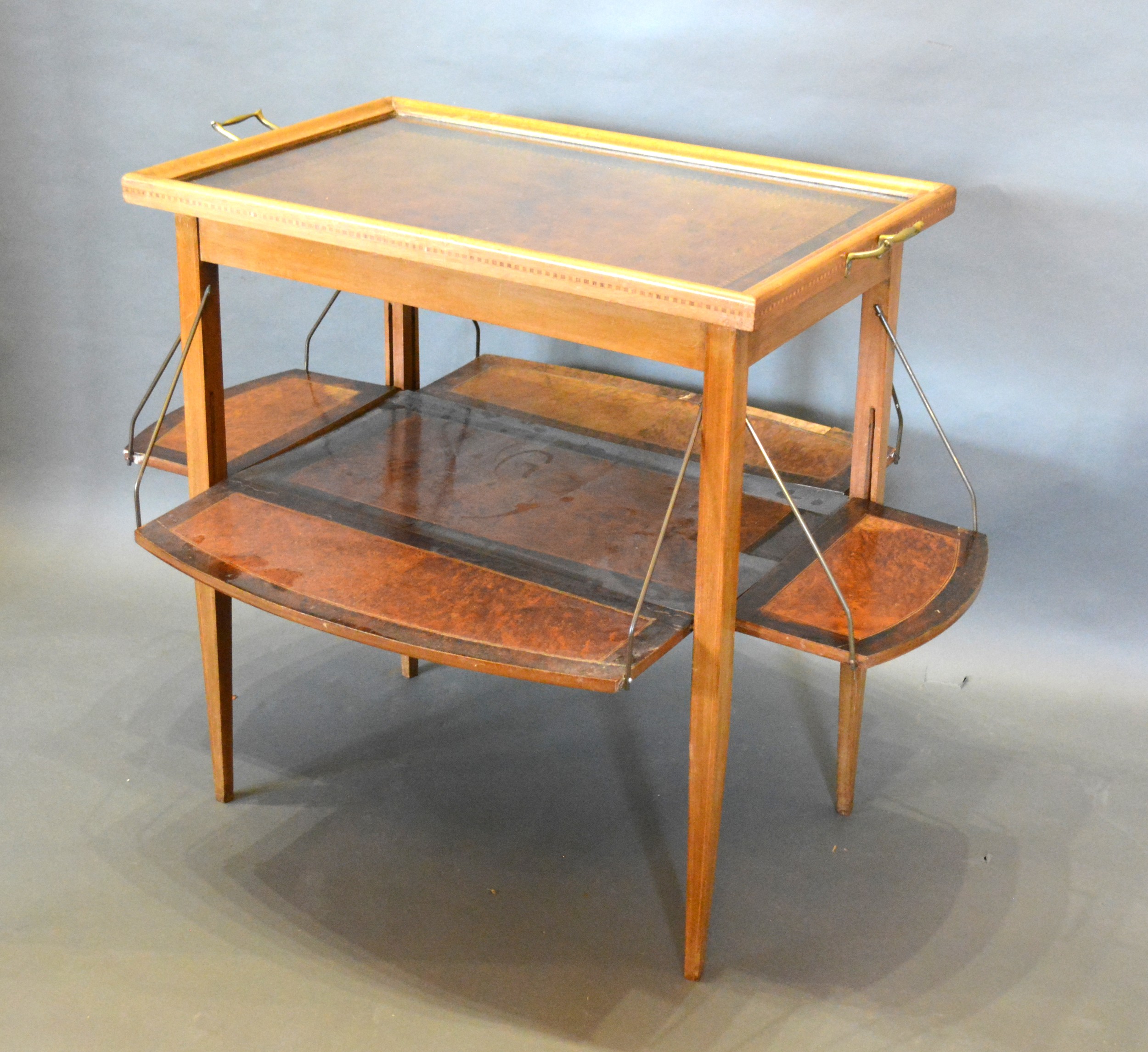 An Edwardian Etagere with removable glass tray top, together with a satinwood bedside cupboard and a