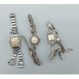 A Vidar Birmingham silver and marcasite set Ladies cocktail watch, together with two other ladies