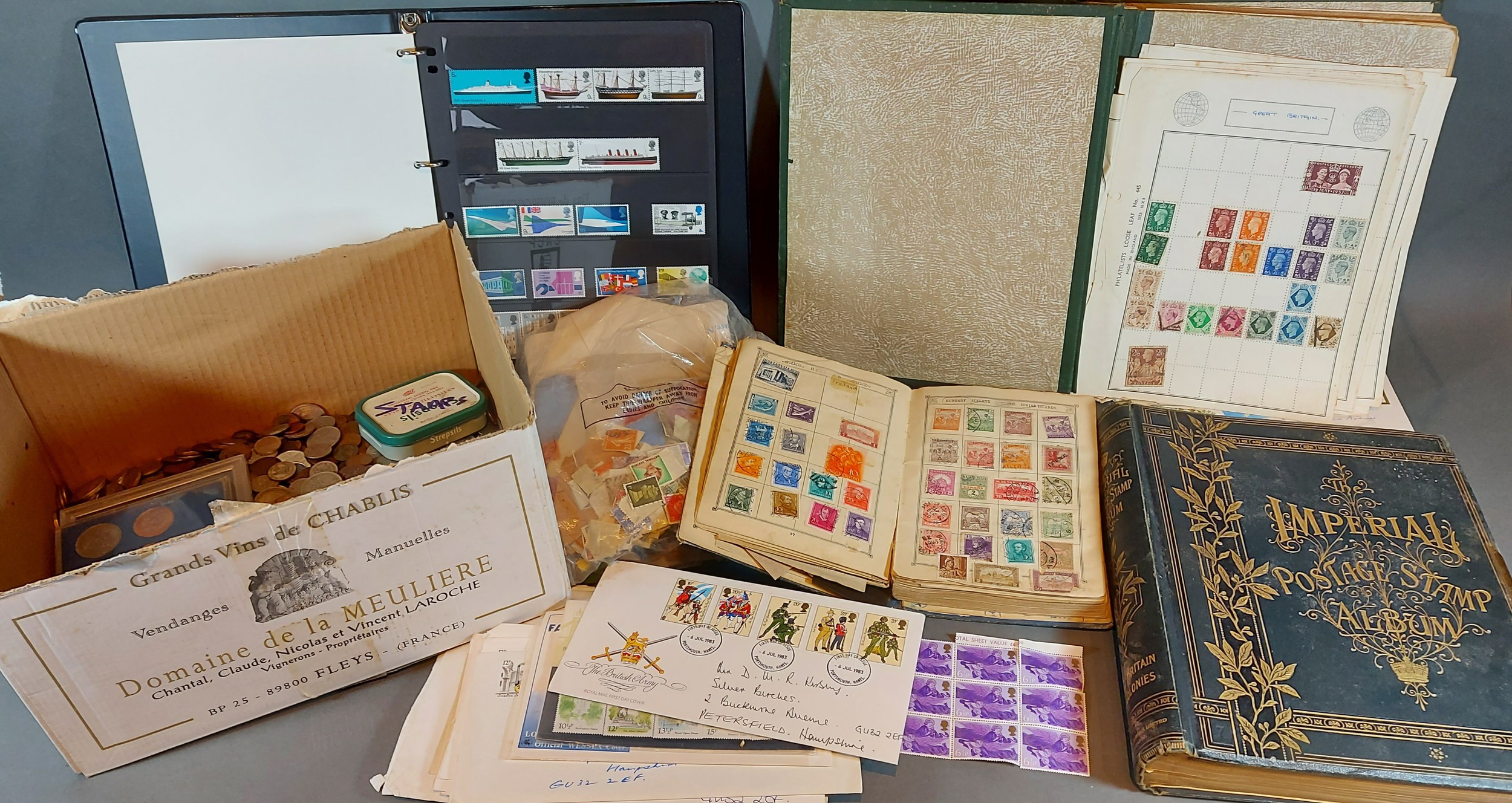 A stamp collection to include Penny Reds and others together with a coin collection