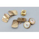 A pair of 9ct gold cufflinks, 3.2gms, together with a 9ct gold and mother of pearl cufflink and a