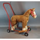 A Pedigree Soft Toys Ltd ride on push along plush horse, 60cms tall