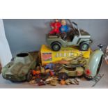 A Palitoy Action Man Jeep in original box, together with other Action Man vehicles, two figures