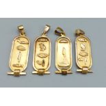 A set of four Egyptian yellow metal pendants, 8.2 grams