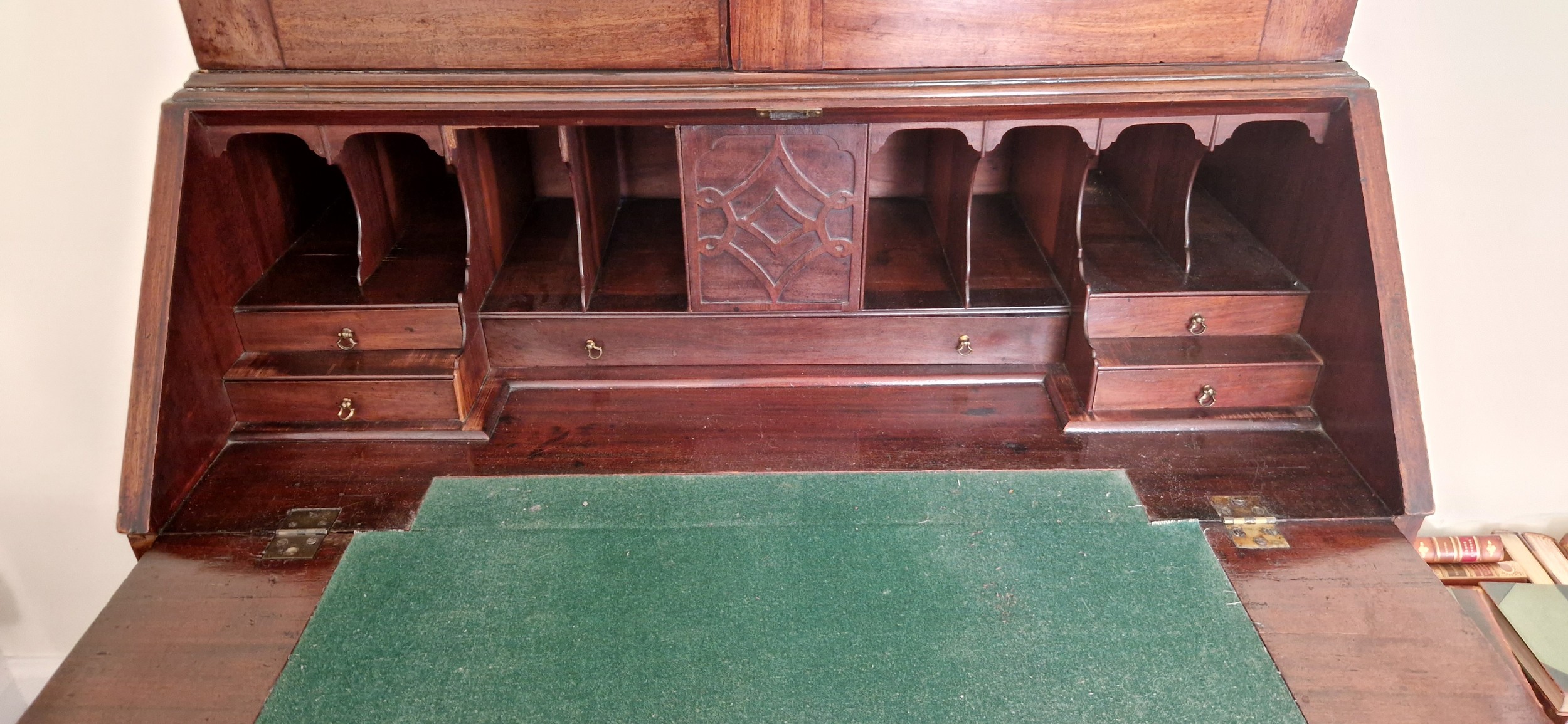 A George III mahogany bureau bookcase, the moulded cornice above two arched glazed doors enclosing - Image 2 of 2