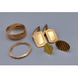 Two 9ct gold wedding bands together with a pair of 9ct gold cufflinks and two 9ct gold studs, 10