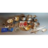 A silver plated trophy cup, together with other silver plated items to include flatware