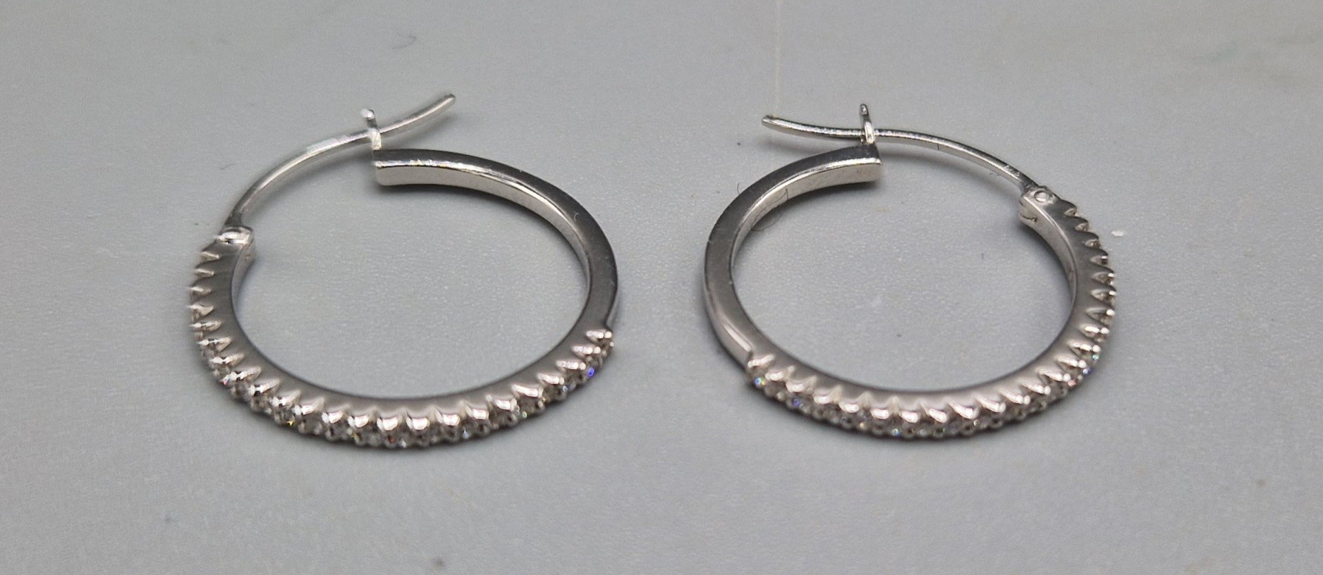 A pair of 14ct white gold hoop earring set with diamonds by Dinny Hall, 2.2gms