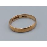 A 22ct gold wedding band, ring size U, 3.2gms