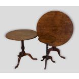 A 19th Century oak pedestal table together with two other similar pedestal tables