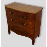 A Victorian mahogany bow fronted chest with two short and two long drawers raised upon bracket feet,