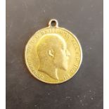 An Edwardian gold half Sovereign with pendant mount dated 1910