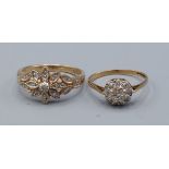A 9ct gold diamond cluster ring, 2.6gms, ring size O together with another 9ct gold diamond