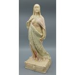 A Royal Doulton vellum eathenware figurine Cleopatra by Charles Noke, impressed signature to base,