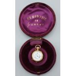 A French gold fob watch, the enamel dial with Roman Numerals and with engraved case and within a