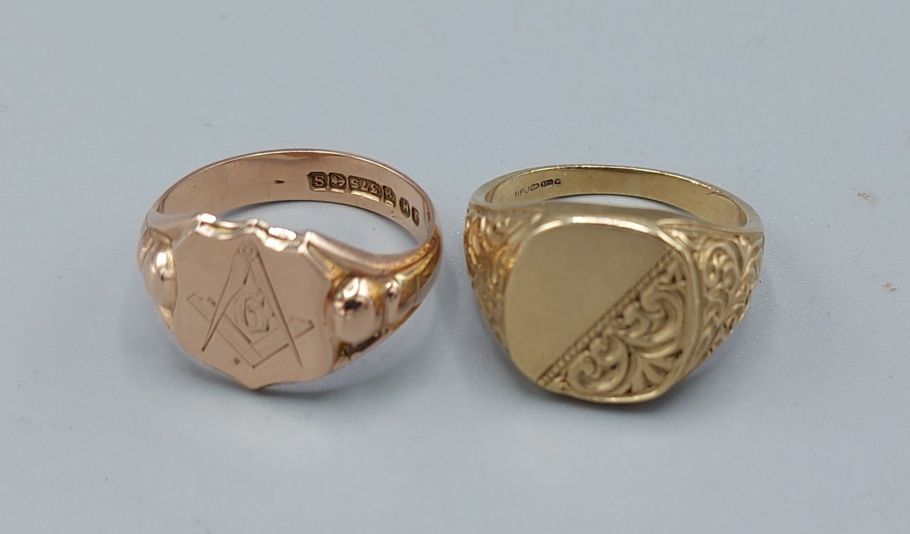 A 9ct gold signet ring with Masonic engraving together with another 9ct gold signet ring, 12.7gms,