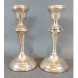 A pair of Birmingham silver candlesticks, 18cms tall