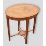 An Edwardian Sheraton revival occasional table with square tapering legs, 57cms x 43cms