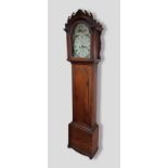 A 19th Century oak longcase clock, the arched hood above a shaped door and plinth base, the