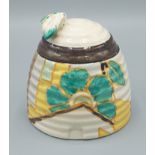 A Clarice Cliff Bizzarre pattern honey pot, 9.5cms tall