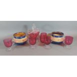 A pair of Royal Doulton stoneware squat vases, together with a collection of cranberry glassware
