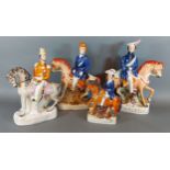 A pair of Staffordshire pottery figures of Sir Colin Campbell and G Havelock upon horseback,
