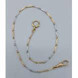 An 18ct white and yellow gold watch chain of linked form, 11gms, 38cms long