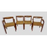 A set of four Danish hardwood dining chairs designed by Henry W. Klein for Bramin each with a rail