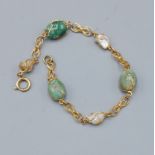 A 9ct gold stone set bracelet of pierced link form, 8.8gms inclusive