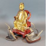 A Chinese carved gilt wood model of a seated man, together with two horn models of insects