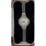 An 18ct white gold and platinum ladies wristwatch