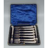 A set of nine Sheffield silver forks, 9ozs