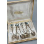 A set of six Sterling silver spoons with M.O.P. handles