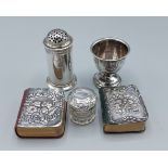 A London silver sander together with a Birmingham silver eggcup, a silver mounted and glass dressing