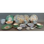 A collection of Chinese ceramics to include plates, cups and saucers and dishes