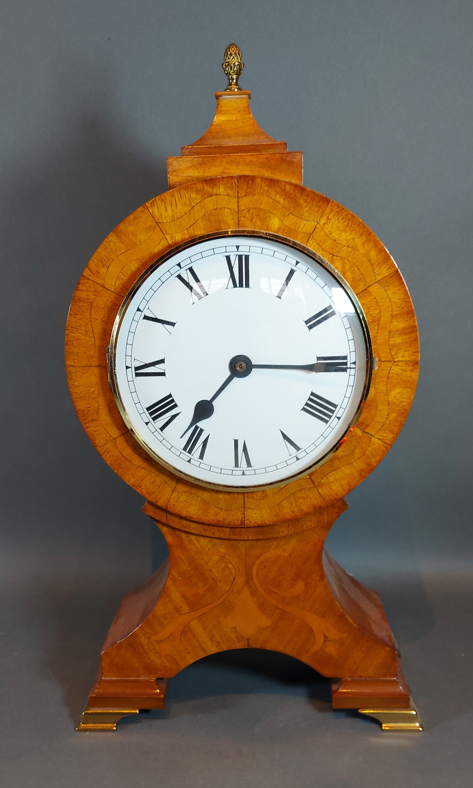 A 20th Century French large inlaid balloon shaped mantle clock (battery movement), 44cms tall