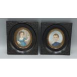 A pair of 19th Century oval portrait miniatures depicting Robert Harcourt and Emilie Harcourt with