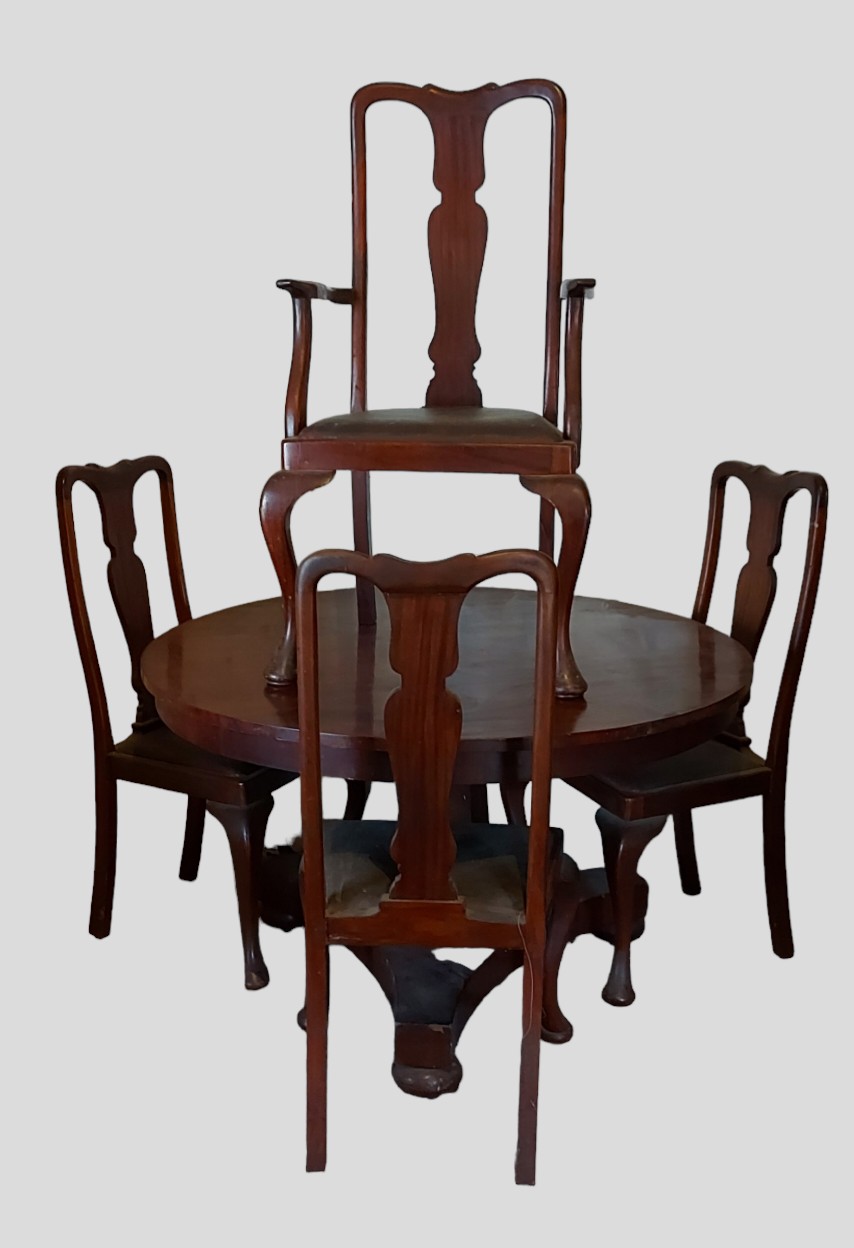 A Victorian mahogany circular centre table together with a set of four Queen Anne style dining