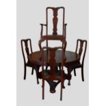 A Victorian mahogany circular centre table together with a set of four Queen Anne style dining