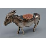 An Edwardian silver pin cushion in the form a of a Donkey, Birmingham 1904, 5.5cms tall by 7.5cm