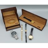 A Fossil stainless cased gentlemans wristwatch together with five other watches