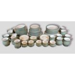 A Denby dinner, tea and coffee service comprising bowls, plates, cups and saucers