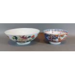 A Chinese bowl, decorated in coloured enamels, 20cms diameter together with another similar bowl,
