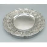 An 800 mark silver bowl of shaped outline with pierced border, 14ozs, 31cms diameter