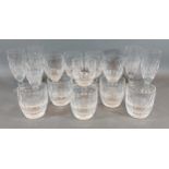A set of four Waterford crystal Colleen pattern wine glasses, 13cms tall, together with eleven other